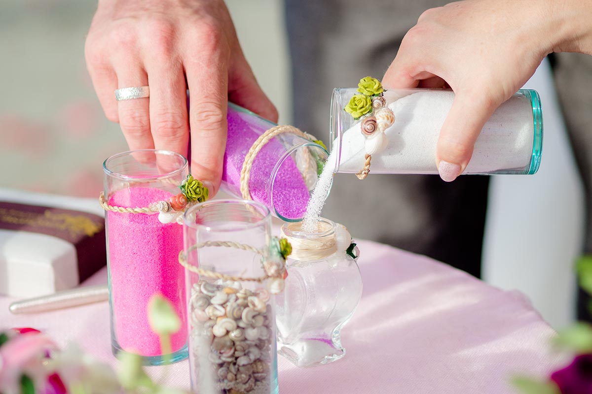 Sand Ceremony – The Couple Pour Their Sands Together