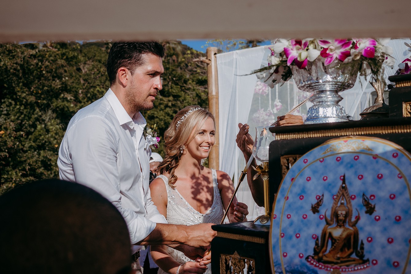 The Buddhist wedding ceremony in Thailand – The lighting of the candle