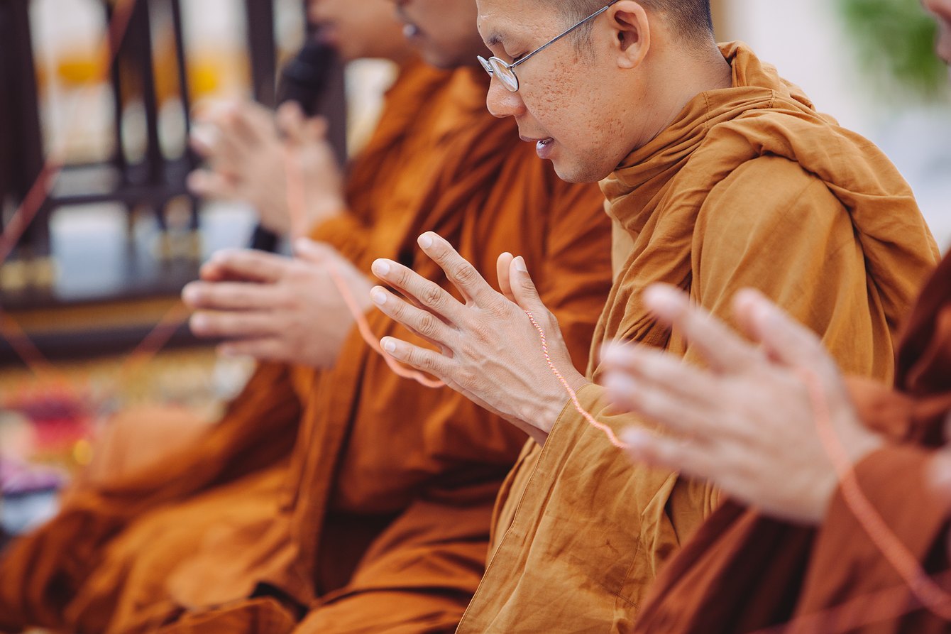 The Buddhist wedding ceremony in Thailand. Monks praying