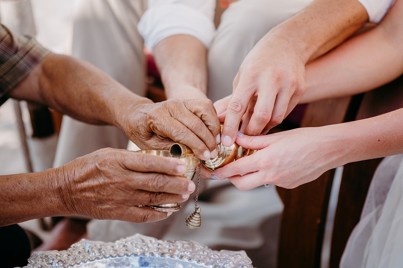 The blessing of water at a Buddhist wedding in Thailand