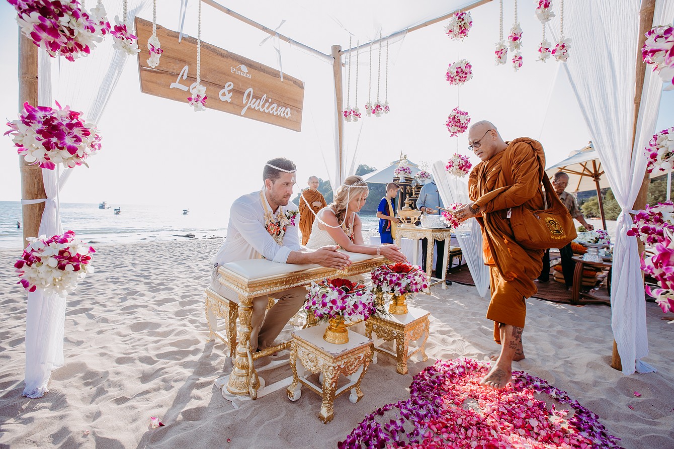 Water blessing at a Buddhist wedding in Thailand